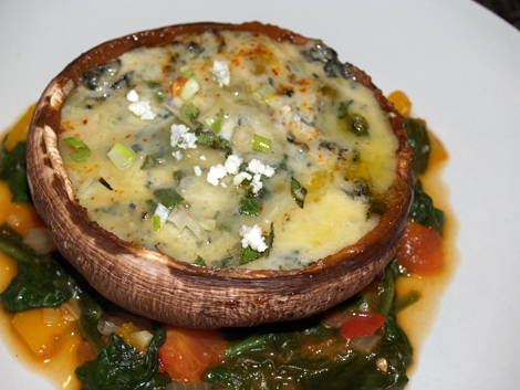 Portobello mushroom on spinach bhaji